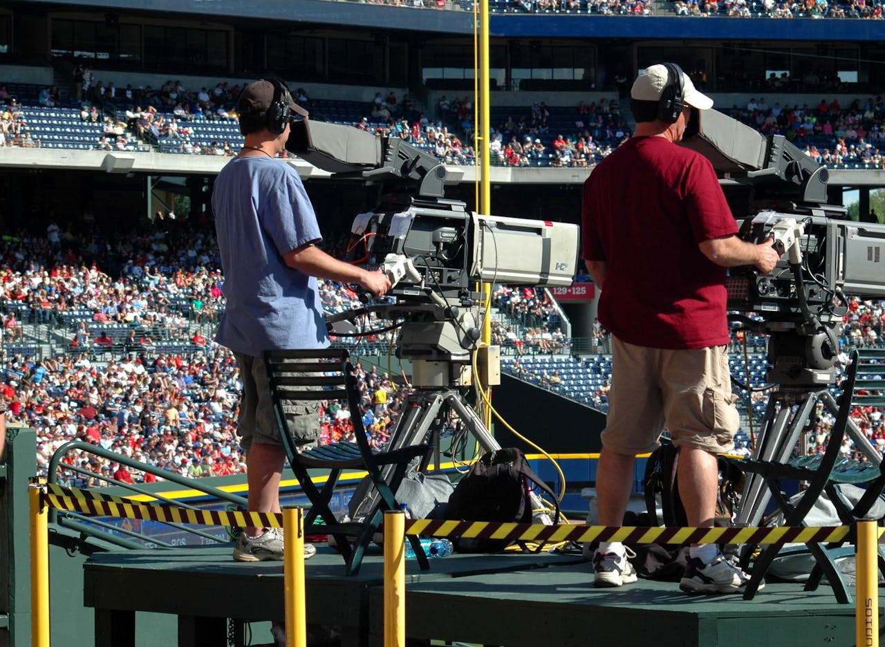 television camera men outdoors ballgame 159400.jpeg